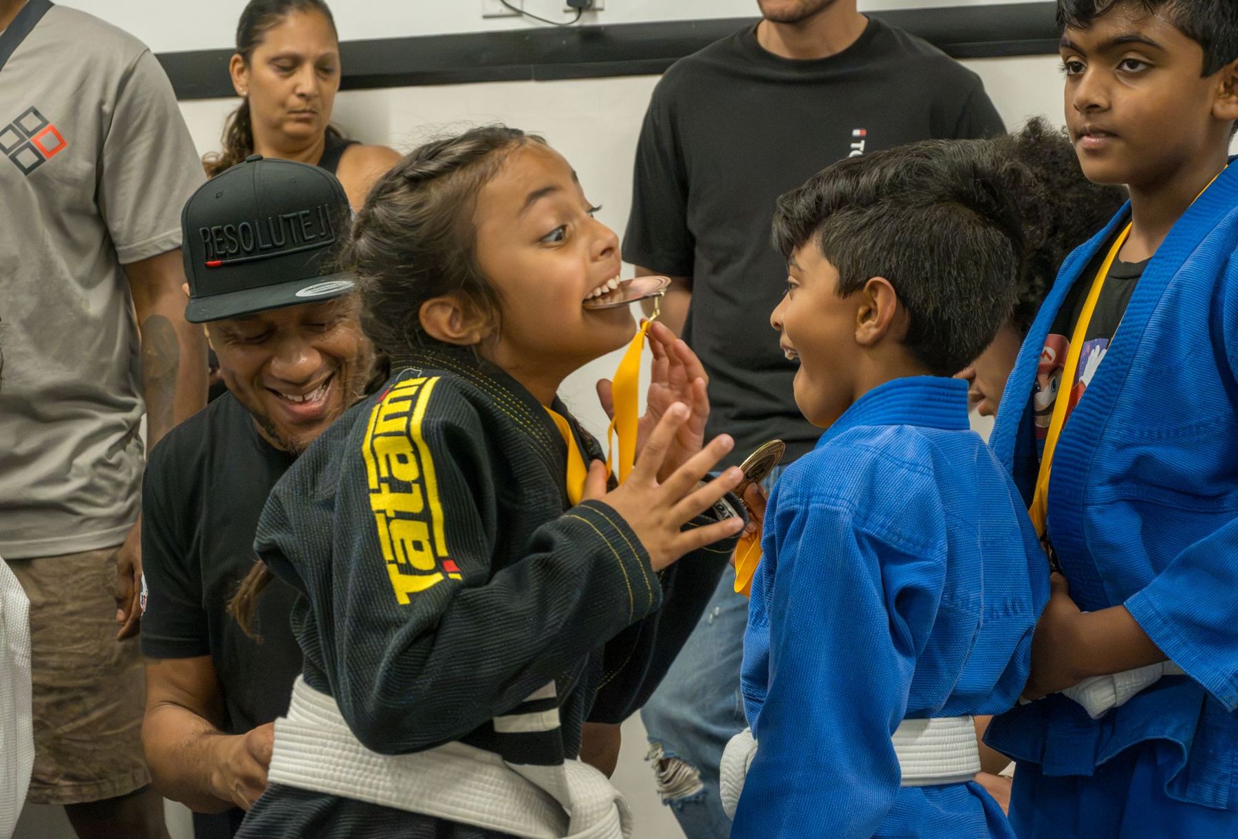 Kids celebrating with their medals